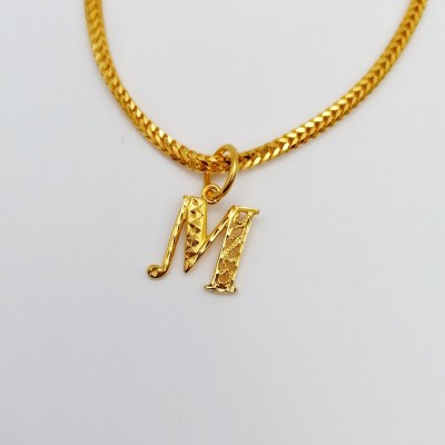 HURUF M gold HURUF M gold